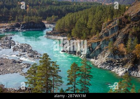 Beautiful view of the dark Turquoise Katun River in the rocky mountains of Altai on a sunny day. Altai Territory in Siberia Stock Photo