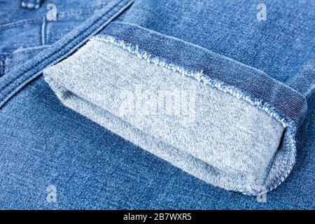 Fine Detail Of Denim. blue woolen texture from suede fabric, close up. Background, texture Stock Photo