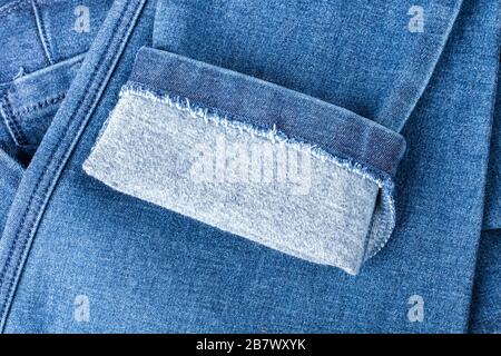 Fine Detail Of Denim. blue woolen texture from suede fabric. Background, texture Stock Photo