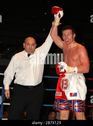 Jack Morris (white/red shorts) defeats Adam Wilcox in Super-Middleweight boxing contest at the Troxy, Limehouse, London, promoted by CityBoxer Stock Photo