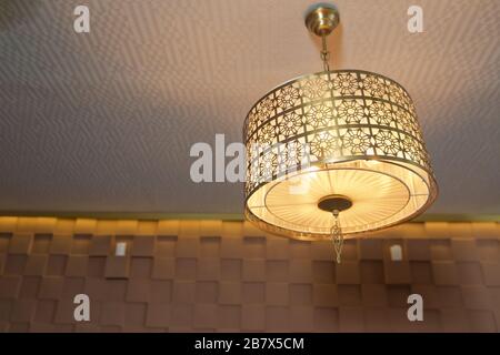 Modern 3-Light Led yellow Chandelier. Pendant Sconce Lighting Lamp . Ceiling Light Oval Pendant Light Fixture. Hanging Lights with Creme Fabric Shade. Stock Photo