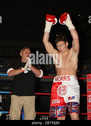 Jack Morris (white/red shorts) defeats Adam Wilcox in Super-Middleweight boxing contest at the Troxy, Limehouse, London, promoted by CityBoxer Stock Photo