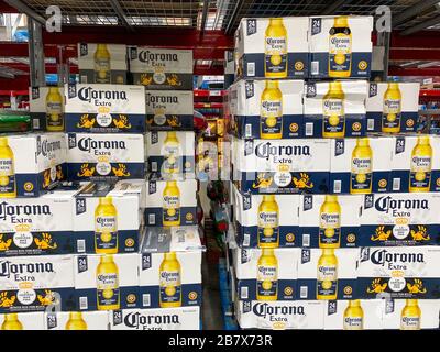 Orlando, FL/USA-3/12/20: A display of boxes of bottles of Corona Extra on a display shelf of a Sams Club Warehouse Grocery Store. Stock Photo