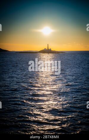 Lighthouse at Sunset Stock Photo - Alamy