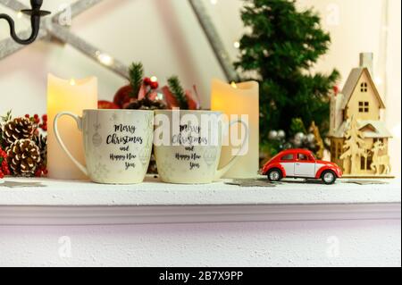 christmas Composition with present box and christmas tree on neutral background. Holiday greeting card. Stock Photo