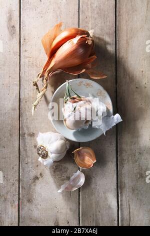 Garlic Onions Still Life on Wood Table Stock Photo