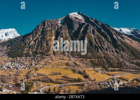 The village Palleusieux under a big mountain, in the Basin Pre-Saint-Didier, Aosta Valley at the timr of corona virus outbreak, northern Italy Stock Photo