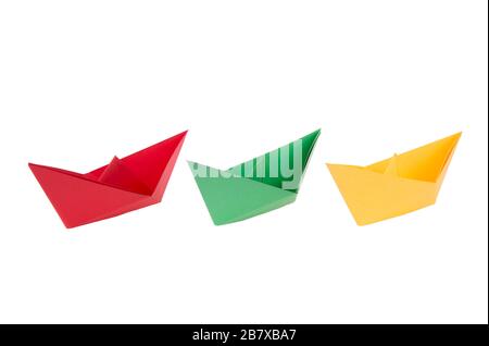 isolated in white boats made ??of folded colored paper