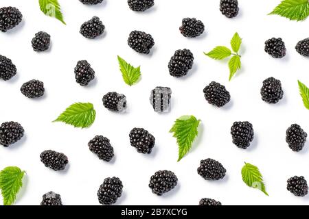 Fresh blackberry with leaves isolated on white background. Top view. Flat lay pattern Stock Photo