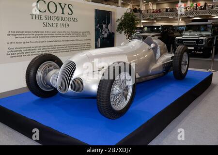 Three-quarters Front View of a 1937, Mercedes-Benz W125 Racing Car, on display at the Coys Stand, of the 2020 London Classic Car Show Stock Photo