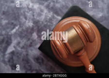 top view of gavel on a book on wooden table  Stock Photo