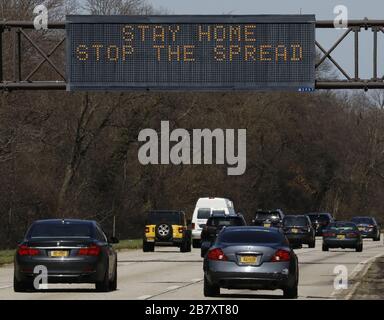 Stay Home Stop The Spread Roadsign Over Grand Central Parkway In