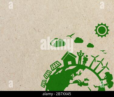 Environmental green energy of family living concept illustration with cardboard cut out on grass. Stock Photo