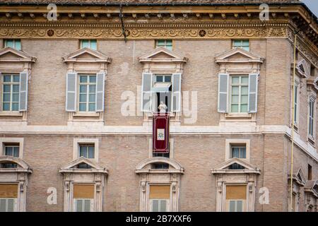 Apostolic palace with blessing Pope Francis in the window in Vatican in Rome in Lazio in Italy during Prayer of the Angelus Stock Photo