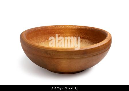 Antique shabby wooden bowl isolated on white background. Stock Photo