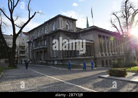 Historic state institution magnificent building with a guard in blue uniform Stock Photo