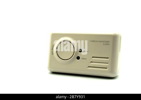 A home carbon monoxide alarm or carbon monoxide detector isolated on a white background Stock Photo
