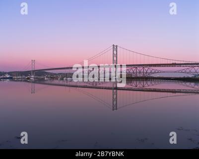 dh Scottish two bridges RIVER FORTH FORTH BRIDGE Across river Forth Scotland Rail Road Bridges dusk