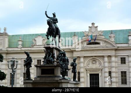 Turin, Piedmont/Italy -04/20/2019- Turin the equestrian statue of Carlo Alberto of Savoy and the National Library on background.