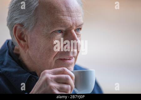 Senior man with coffee cup Stock Photo