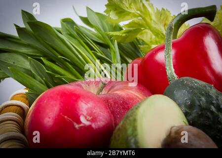 Set of vegetables and fruits in a wicker basket Stock Photo