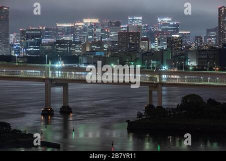 Panoramic modern city skyline bird eye aerial view of Tokyo bay under rainy night Stock Photo