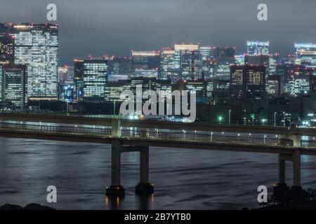 Panoramic modern city skyline bird eye aerial view of Tokyo bay under rainy night Stock Photo