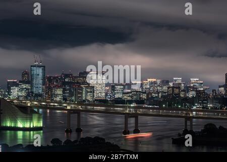 Panoramic modern city skyline bird eye aerial view of Tokyo bay under rainy night Stock Photo