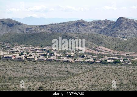 Outside of Phoenix housing communities continue to grow in the desert. Stock Photo