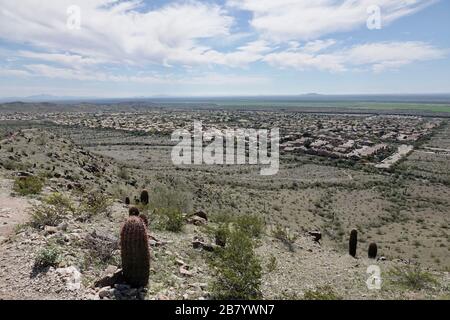 Outside of Phoenix housing communities continue to grow in the desert. Stock Photo