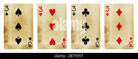 Four Playing Cards Isolated on White Background, Showing Three from Each Suit - Hearts, Clubs, Spades and Diamonds. Stock Photo