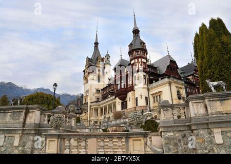 Famous Peles Castle and ornamental garden in Romania, landmark of Carpathian Mountains in Europe Stock Photo