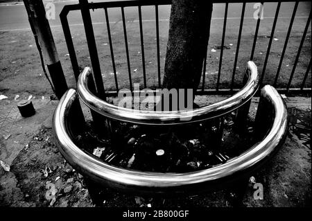 Metal stainless steel tube bench for sitting, Art Plaza, Kala Ghoda, Fort, Bombay, Mumbai, Maharashtra, India, Asia Stock Photo