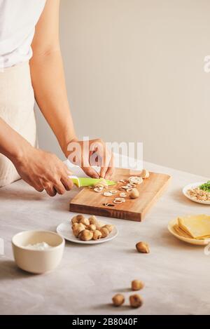 Wrapping Wonton and raw ingredients isolated at kitchen Stock Photo