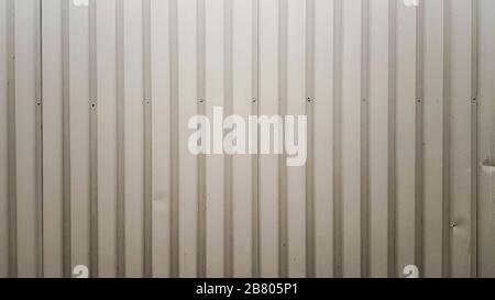 Old zinc abstract. Zinc vintage background view. crumpled metal plate of the fence. Tin roof background with a hole of rust and nails vintage style. Z Stock Photo