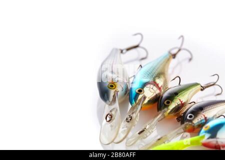 Plastic fishing lures on a white background. Place for your text. Stock Photo