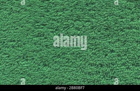 Green towel textural surface. Green towel background Stock Photo