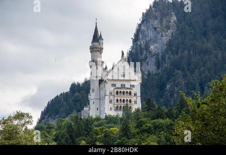 Neuschwanstein castle in bavaria, germany cloudy mood mountain Stock Photo