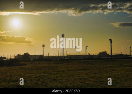 Low angle shot of electricity poles in the evening in Coruna, Galicia, Spain Stock Photo