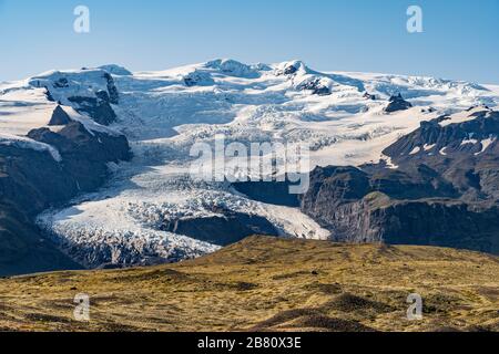 obvious glacier melting due to global warming at Vatnajokull glacier with Skaftafell glacier tongue in Iceland Stock Photo