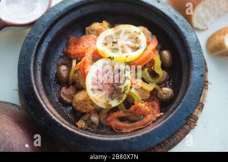 Meatballs raw frying grill with vegetables, Moroccan restaurant Stock Photo