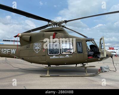 Singapore - Feb 12, 2020. Subaru Bell 412EPX helicopter standing for display in Changi Air Base. Defense costs are increasing, especially in East Asia Stock Photo