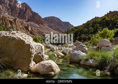 Inside the narrow canyon of Wadi Tiwi at Shab near Mascat in Oman Stock Photo