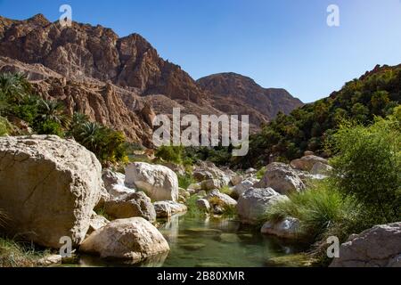 Inside the narrow canyon of Wadi Tiwi at Shab near Mascat in Oman Stock Photo