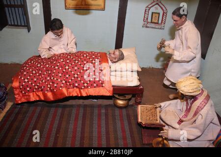 Mohandas (Mahatma) Gandhi nursing his ailing father where he also discussed various faiths Stock Photo