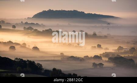 The sun rises over the Somerset levels. Stock Photo