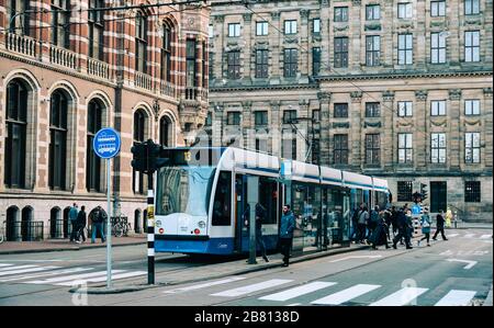 Amsterdam, Holland - Oct 7, 2018. Metro train at downtown in Amsterdam, Holland. Amsterdam known for its artistic heritage and narrow houses with gabl Stock Photo