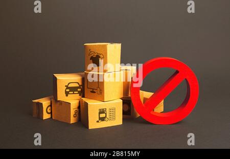 Cardboard boxes and red prohibition symbol NO. Import restriction, ban export goods. Lack of goods, deficit shortage, Out of stock. Embargo sanctions, Stock Photo