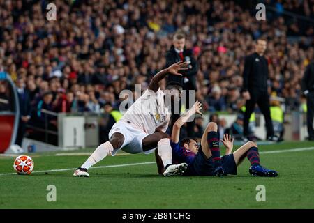 BARCELONA, SPAIN - APRIL 16:  Paul Pogba of Manchester United and Sergio Busquets of FC Barcelona during the UEFA Champions League Quarter Final secon Stock Photo