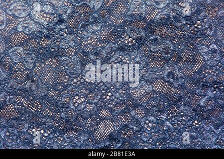 image lace on fabric vegetable openwork background in blue Stock Photo